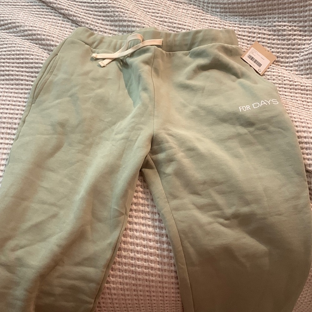 For Days brand light green jogger sweatpants. Brand new never worn size M.